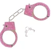 Håndjern med pink sten